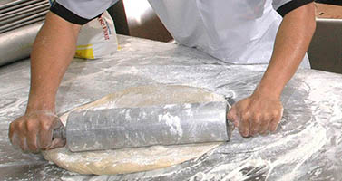 manos manipulador de alimentos